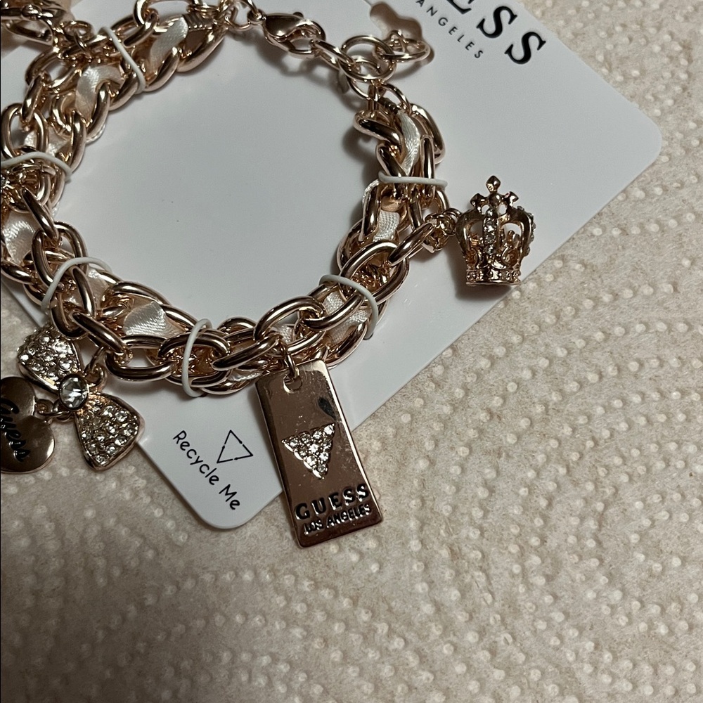 Guess Gold-Tone Charm Bracelet with Sparkling Accents - Picture 3 of 4